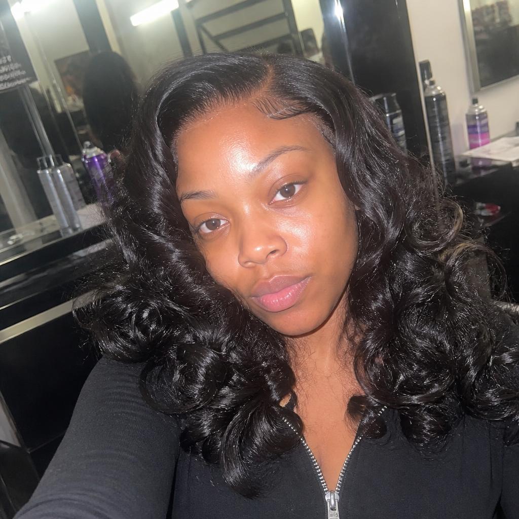 Client with an HD lace melt install styled in voluminous curls